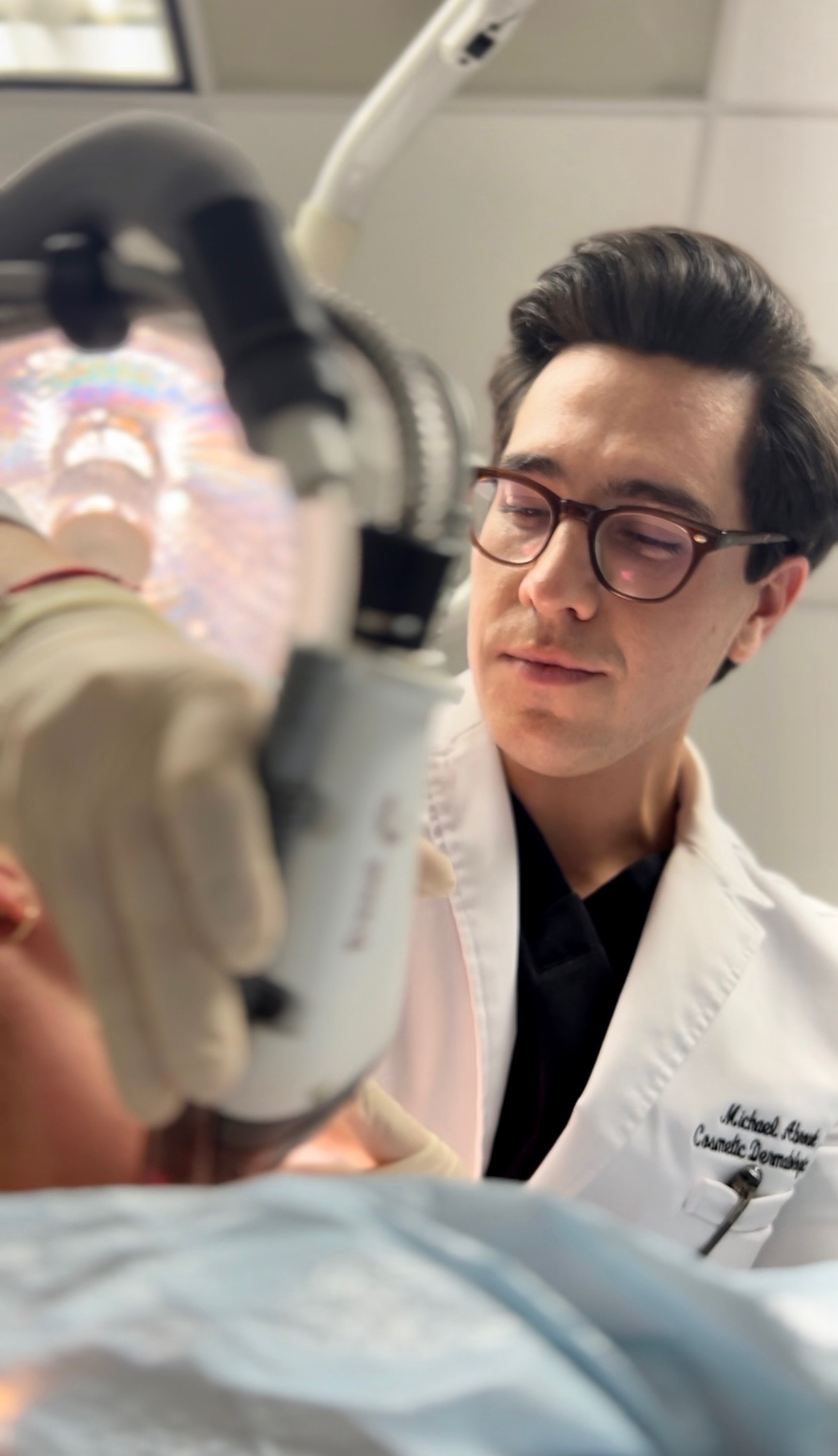 Dr. Michael Abrouk performing a laser procedure